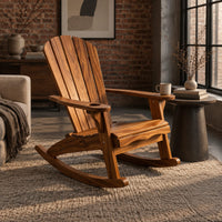 Adirondack style rocking chair with a slatted fan back and wide armrests in an industrial loft living room with exposed brick