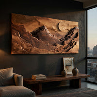 Panoramic amber mountain valley wall art above a low console in an evening living room