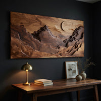 Panoramic amber mountain valley wall art above a desk in a dark study corner