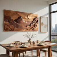 Panoramic amber mountain valley wall art beside a dining table in natural light