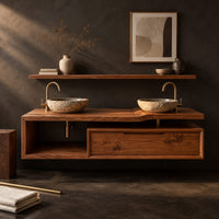 Corner detail of floating bathroom vanity cabinet with a stepped slab top and open cubby beside wood, brass and linen samples