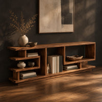 Open shelf console table with stepped square cubbies on a slim plinth, three-quarter view showing the grain