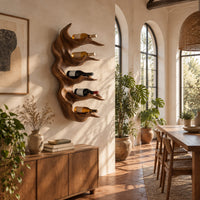 Antler style wine holder with stacked prongs and flowing grain in a bright dining room with arched windows and plants