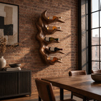 Antler style wine holder with stacked prongs and flowing grain in an industrial loft dining room with exposed brick