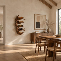 Antler style wine holder with stacked prongs and flowing grain in a bright open plan dining room