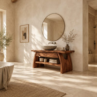 Wood vanity with a thick plank top and arched legs over an open shelf in a bright open plan bathroom