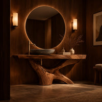 Freestanding bathroom vanity with a thick slab top on a carved forked base in an evening bathroom with walnut wall paneling