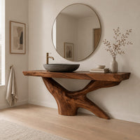 Freestanding bathroom vanity with a thick slab top on a carved forked base in a Scandinavian bathroom with white walls
