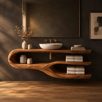 Bathroom vanity with a looping side and two open shelves in a dark studio against a charcoal plaster wall