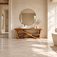 Freestanding vanity on a branching loop frame with open shelf spaces in a bright open plan bathroom