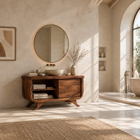 Bathroom vanity with an open cubby and one door on flared feet in a bright open plan bathroom