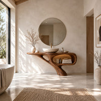 Bathroom vanity with a sculpted pedestal foot and an open oval niche in a bright open plan bathroom