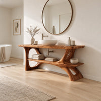 Bathroom vanity with sculpted tree limb legs and a wide lower shelf in a Scandinavian bathroom with white walls
