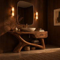 Bathroom vanity with a thick top, single drawer and twisting trunk base in an evening bathroom with walnut wall paneling