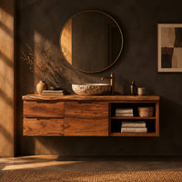 Floating cabinet with stacked wood fronts and open two level shelving in a dark bathroom at golden hour