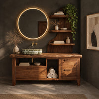 Corner detail of bathroom vanity with three drawers, an open bay and a tall shelf tower beside wood, brass and linen samples