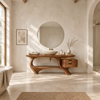 Sculpted bathroom vanity with a loop base and a two drawer box in a bright open plan bathroom