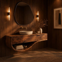 Floating bathroom vanity with a two panel front and sweeping open shelf in an evening bathroom with walnut wall paneling