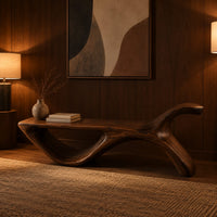 Long flat bench with an open loop base and one raised end in an evening entryway with walnut wall paneling