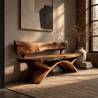 Bench with a natural edge slab back and angled arched legs in an industrial loft entryway with exposed brick