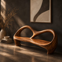 Bench with an open looping backrest and sculpted legs, three-quarter view showing the grain
