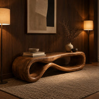 Low wood bench shaped as a figure eight loop with a smooth top in an evening entryway with walnut wall paneling