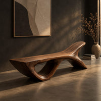 Bench with a fish tail upsweep and a large open arch, three-quarter view showing the grain