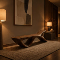 Bench with a fish tail upsweep and a large open arch in an evening entryway with walnut wall paneling