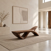 Bench with a fish tail upsweep and a large open arch in a bright open plan entryway