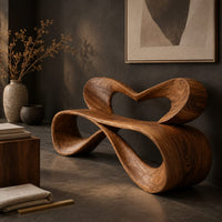 Corner detail of bench with a heart shaped open back and a folded ribbon seat beside wood, brass and linen samples