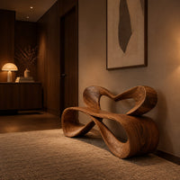 Bench with a heart shaped open back and a folded ribbon seat in an evening entryway with walnut wall paneling