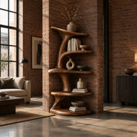 Asymmetrical bookshelf shaped like a twisting branch with stacked oval shelves in an industrial loft living room with exposed brick