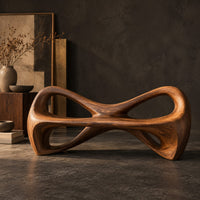 Corner detail of bow tie bench with two large open loops and a thick smooth frame beside wood, brass and linen samples
