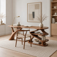 Writing desk with a branch shaped leg and stacked open shelves in a Scandinavian home office with white walls
