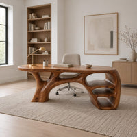 Sculpted wooden desk with branching legs and open shelves at one end in a Scandinavian home office with white walls