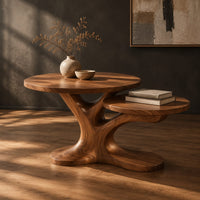 Coffee table with two tops on a branching tree shaped pedestal, three-quarter view showing the grain