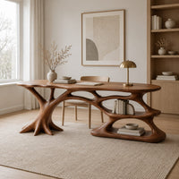 Desk with branching root base, freeform top and open lower shelf in a Scandinavian home office with white walls