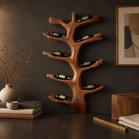 Corner detail of branching tree wine rack with angled arms that cradle bottles beside wood, brass and linen samples
