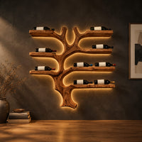Branching tree wine rack with wide shelf arms and a root shaped foot in a dark studio against a charcoal plaster wall