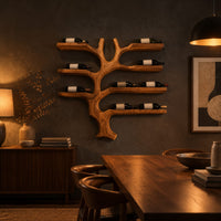 Branching tree wine rack with wide shelf arms and a root shaped foot in a dark dining room at golden hour