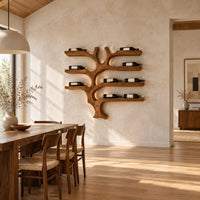 Branching tree wine rack with wide shelf arms and a root shaped foot in a bright open plan dining room