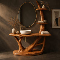 Corner detail of bathroom vanity with a branching trunk base, oval plinth and tiered side shelves beside wood, brass and linen samples