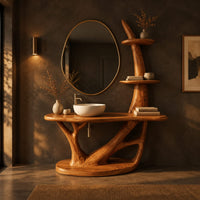 Bathroom vanity with a branching trunk base, oval plinth and tiered side shelves in a dark bathroom at golden hour