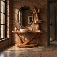 Bathroom vanity with a branching trunk base, oval plinth and tiered side shelves in an industrial loft bathroom with exposed brick