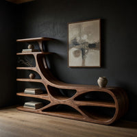 TV stand with branching floating shelves on a carved base, three-quarter view showing the grain
