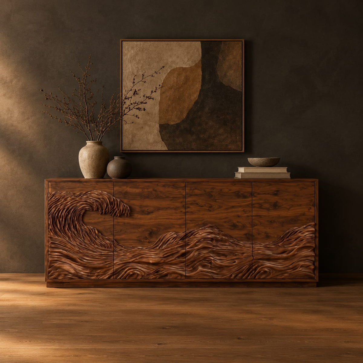 Sideboard with a carved breaking wave across the doors in a dark studio against a charcoal plaster wall