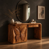 Desk style vanity with a butterfly carved cabinet and a single drawer, three-quarter view showing the grain