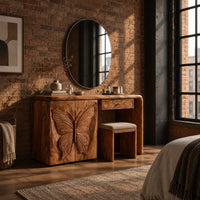 Desk style vanity with a butterfly carved cabinet and a single drawer in an industrial loft bedroom with exposed brick