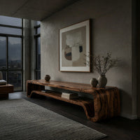 C curve TV cabinet with figured grain in a concrete and timber loft
