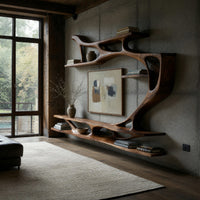 Branching wall TV shelf system in carved wood in a concrete and timber loft